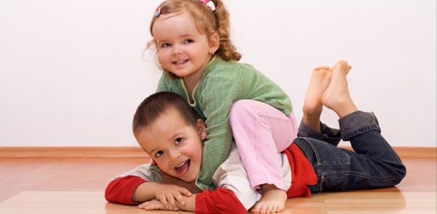 girl-and-boy-roughhousing-612x300